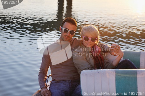 Image of couple in love  have romantic time on boat