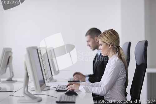 Image of business people group working in customer and help desk office