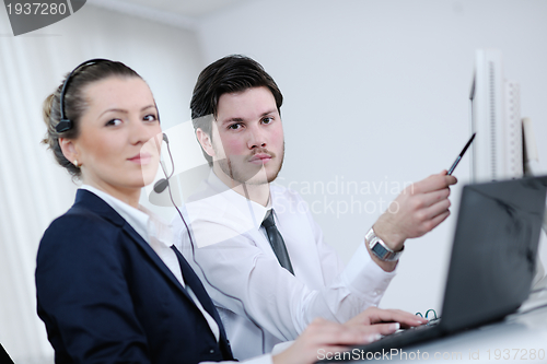 Image of business people group working in customer and help desk office