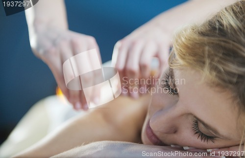 Image of Beautiful young woman in spa