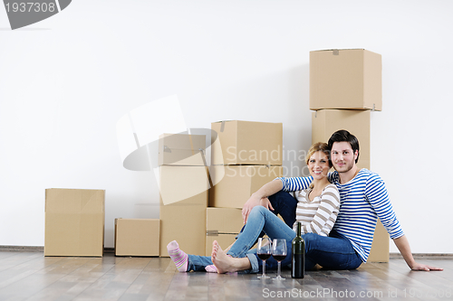 Image of Young couple moving in new house