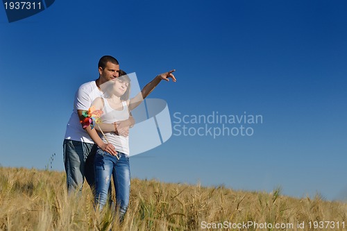 Image of happy couple in wheat field