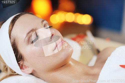 Image of Beautiful young woman in spa