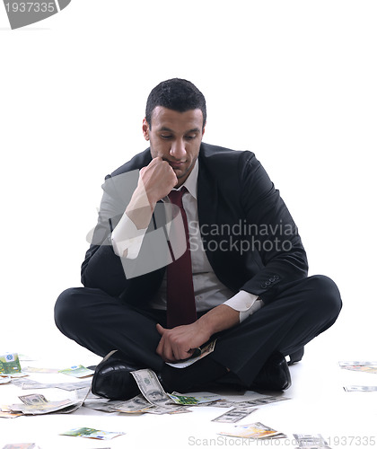 Image of Business man holding money