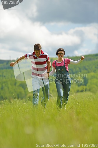 Image of romantic young couple in love together outdoor