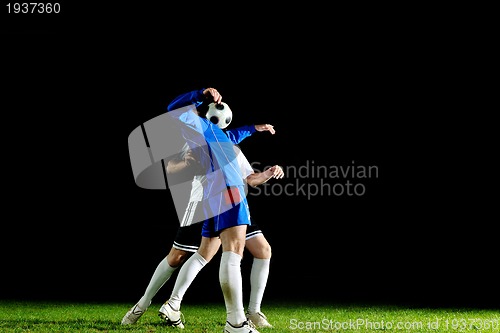 Image of football players in action for the ball