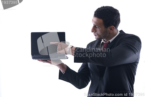 Image of business man work on mini laptop