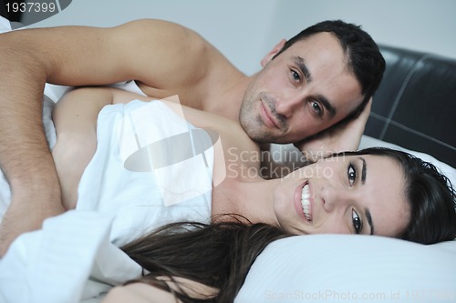 Image of young couple have good time in their bedroom