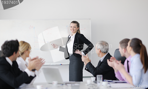 Image of Group of young business people at meeting