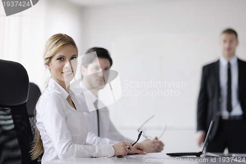 Image of business people in a meeting at office