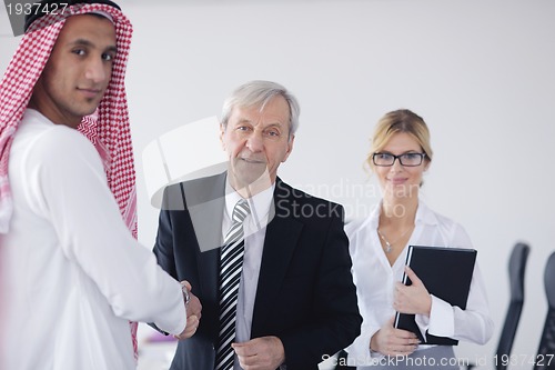 Image of Arabic business man at meeting