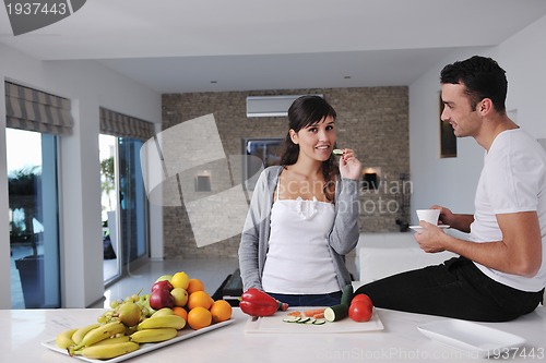 Image of young couple have fun in modern kitchen