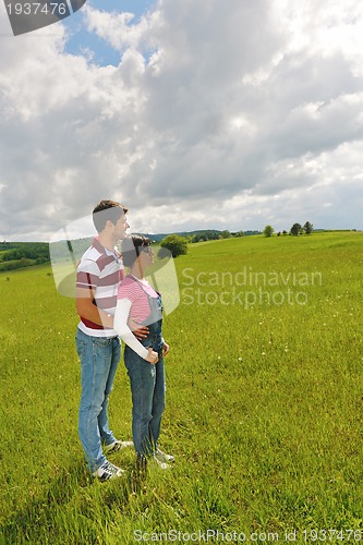 Image of romantic young couple in love together outdoor