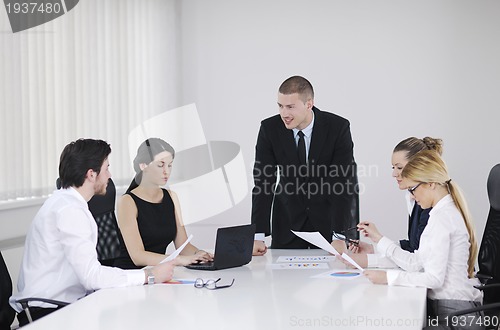 Image of business people in a meeting at office