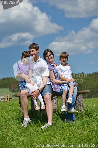 Image of happy young family have fun outdoors