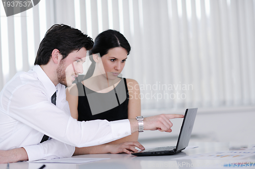 Image of business people in a meeting at office