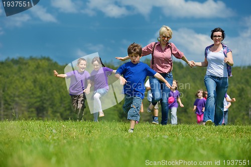 Image of happy kids group  have fun in nature