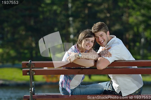 Image of romantic young couple in love together outdoor