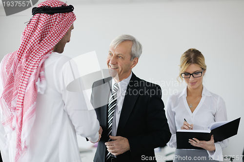 Image of Arabic business man at meeting