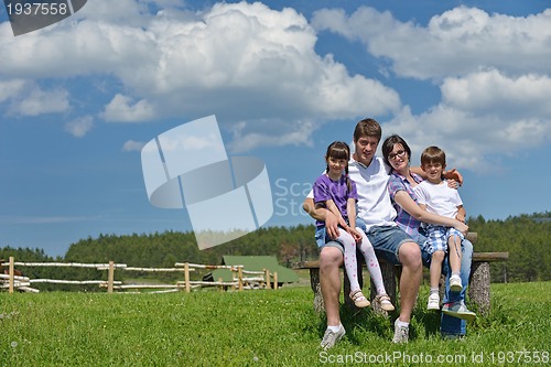 Image of happy young family have fun outdoors