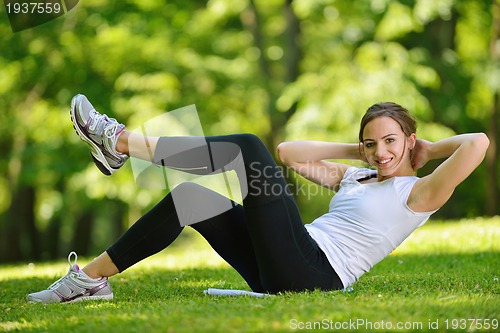 Image of woman stretching before fitness