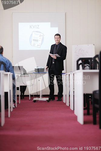 Image of business man on seminar