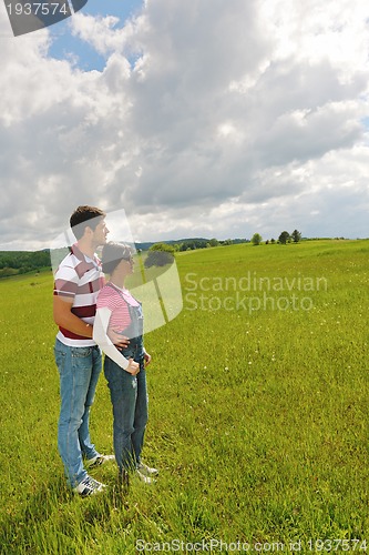 Image of romantic young couple in love together outdoor