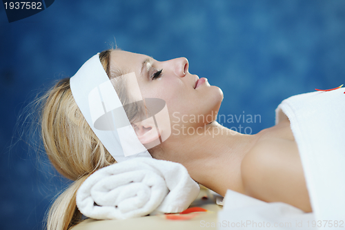 Image of Beautiful young woman in spa