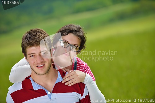 Image of romantic young couple in love together outdoor
