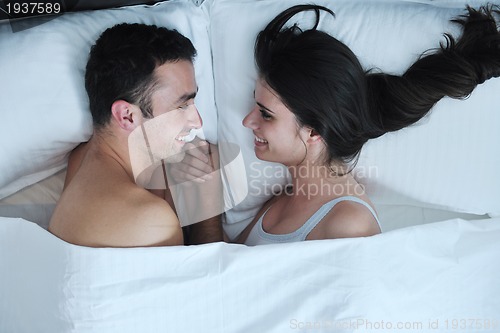 Image of young couple have good time in their bedroom