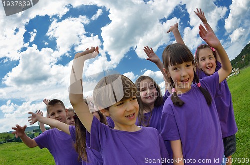 Image of happy kids group  have fun in nature