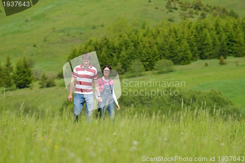 Image of romantic young couple in love together outdoor