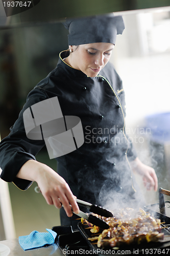 Image of chef preparing meal