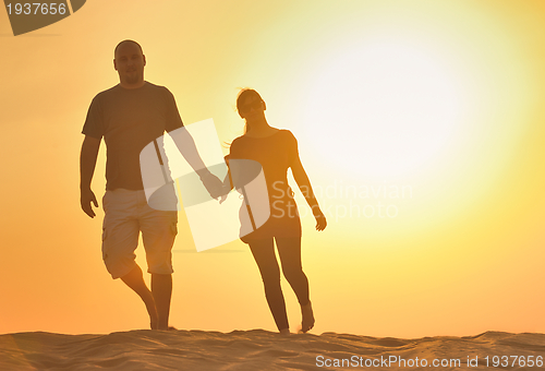 Image of couple enjoying the sunset