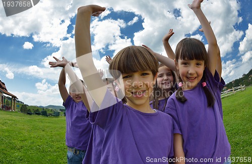 Image of happy kids group  have fun in nature