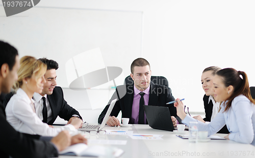 Image of Group of young business people at meeting