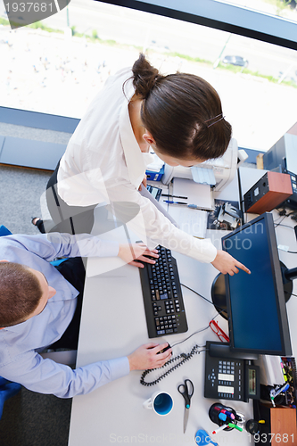 Image of business people in a meeting at office