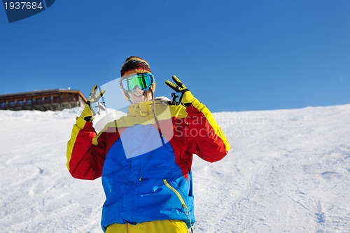 Image of skiing on fresh snow at winter season at beautiful sunny day