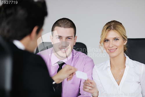 Image of Group of young business people at meeting