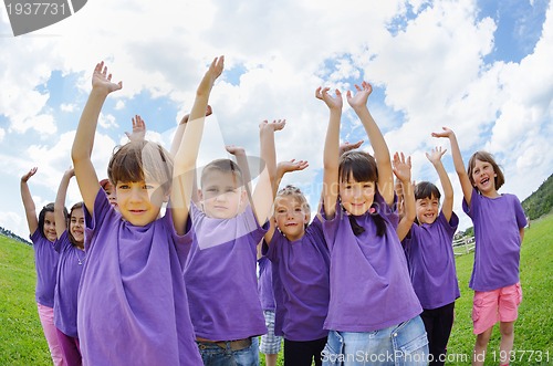 Image of happy kids group  have fun in nature