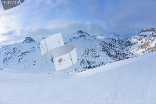 Image of skiing on fresh snow at winter season at beautiful sunny day