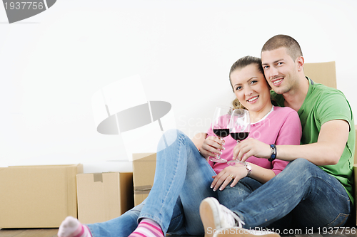 Image of Young couple moving in new house