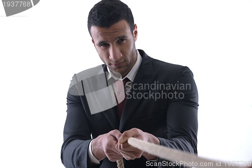 Image of business man with rope isolated on white background