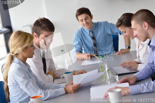 Image of business people in a meeting at office