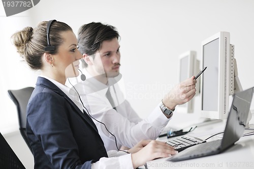 Image of business people group working in customer and help desk office