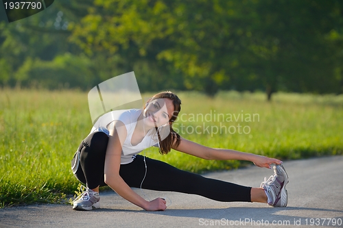 Image of woman stretching before fitness