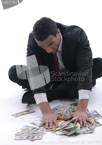 Image of Business man holding money