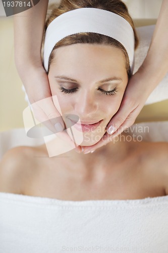 Image of Beautiful young woman in spa