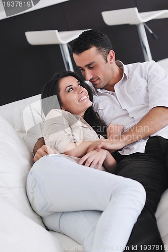 Image of happy young couple relax at home