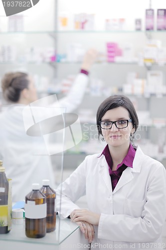 Image of team of pharmacist chemist woman  in pharmacy drugstore